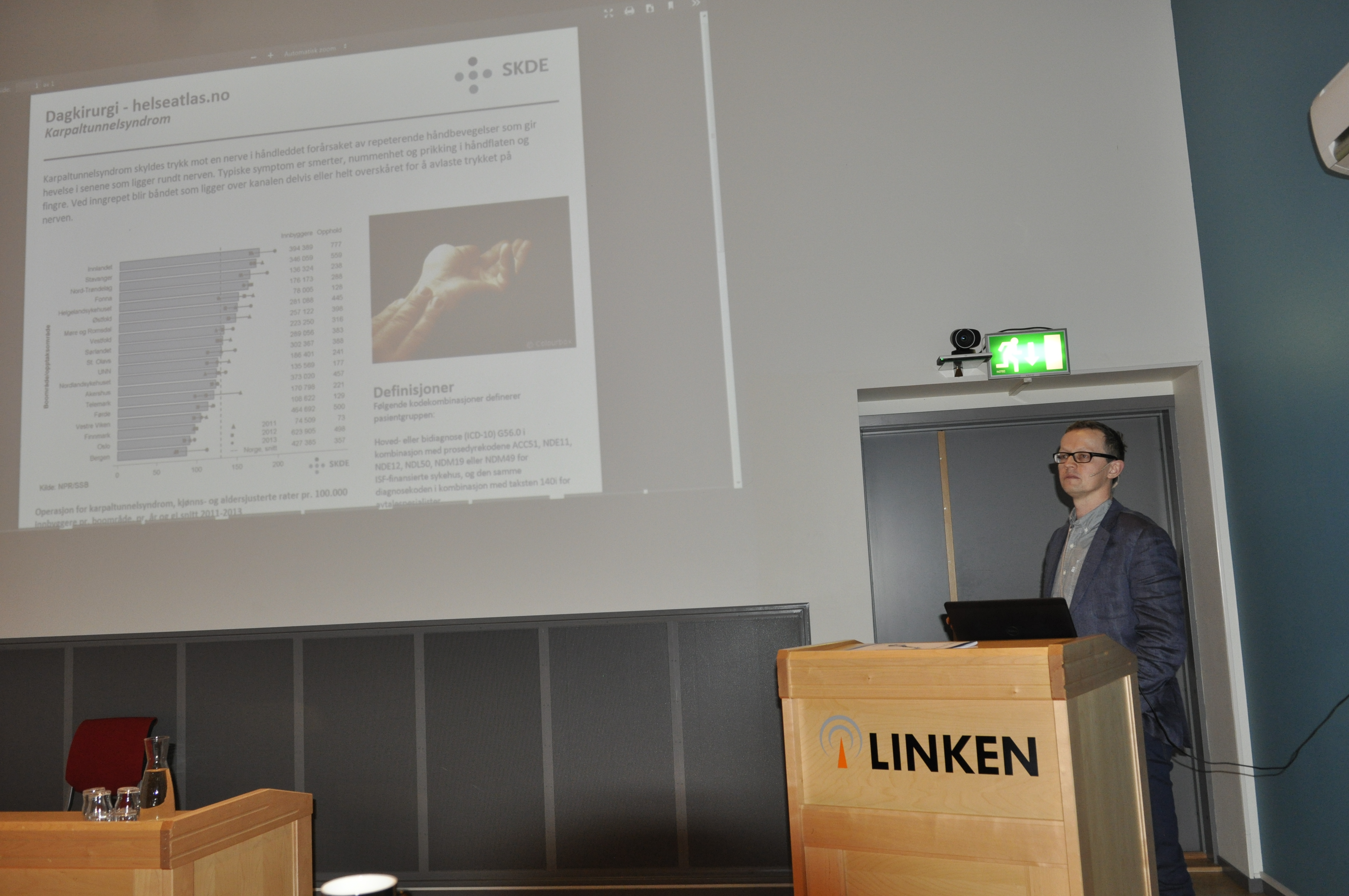 Frank Olsen holder presentasjon om Helseatlas i 2015